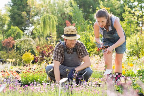 Company representative inspecting a garden